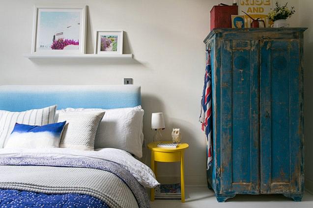 rdeco_bedroom with blue distressed cabinet and blue bed